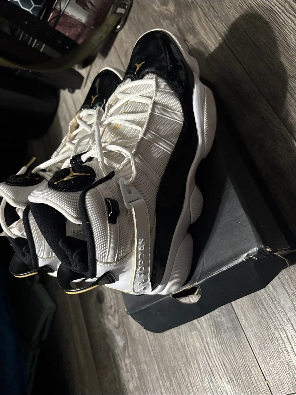 Jordan Retro Basketball Sneakers in White, Black & Gold